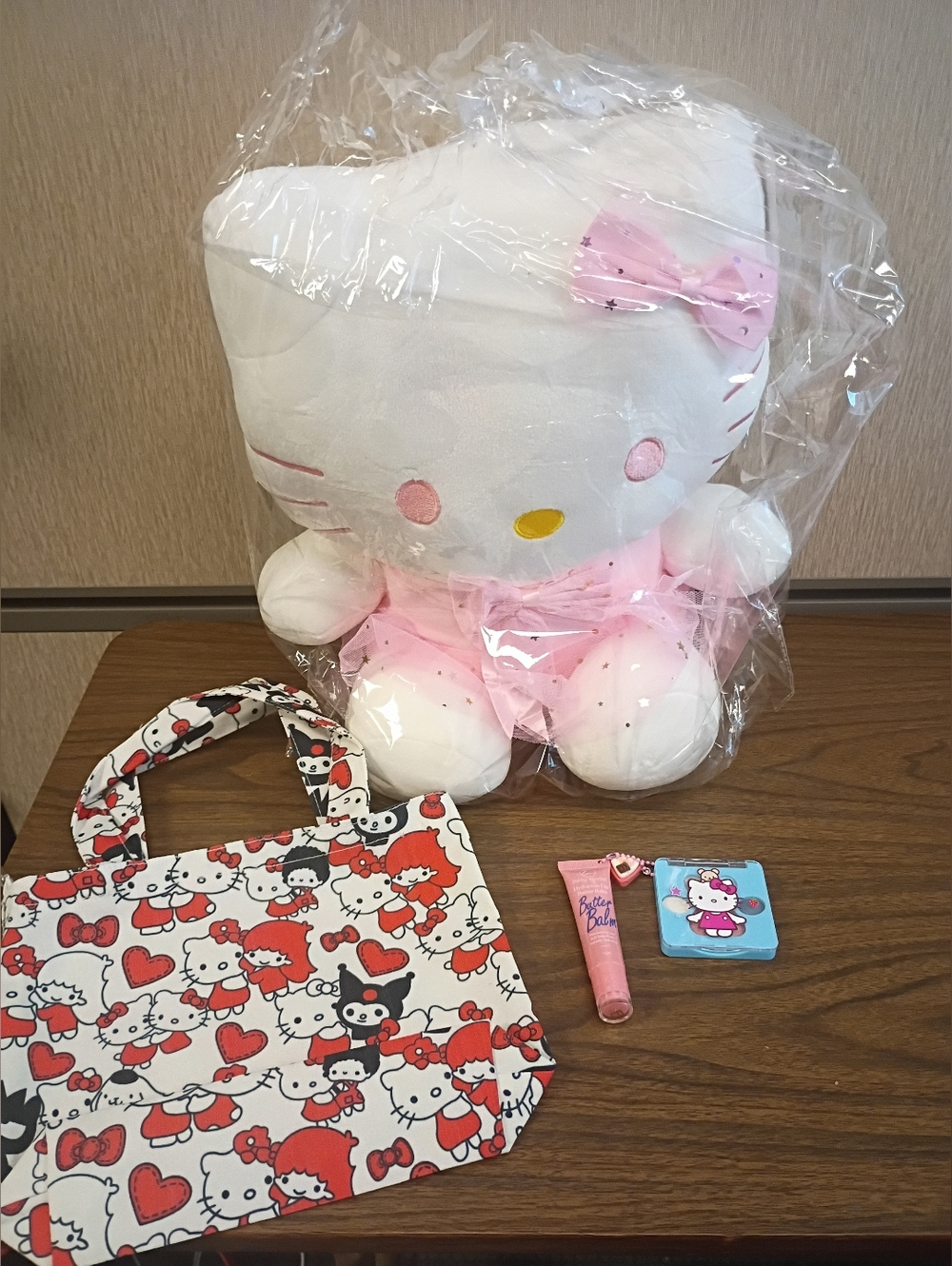 Jumbo 14in Hello Kitty Plush with Blanket 42 x 64in, Tote, Eyeshadow, & Balm Lot